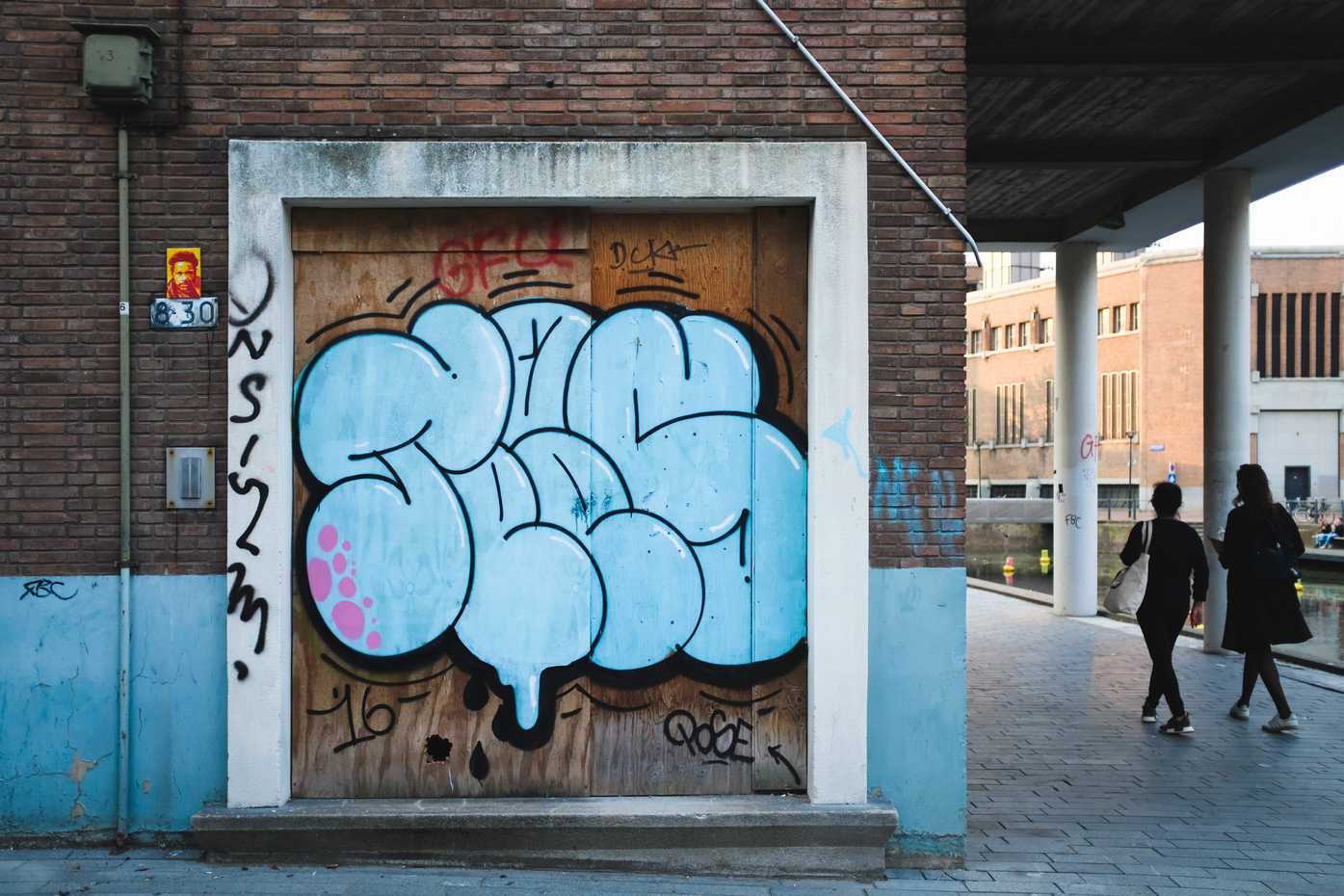 Graffiti on a plywood door